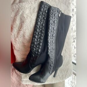 Tall heeled black boots faux leather